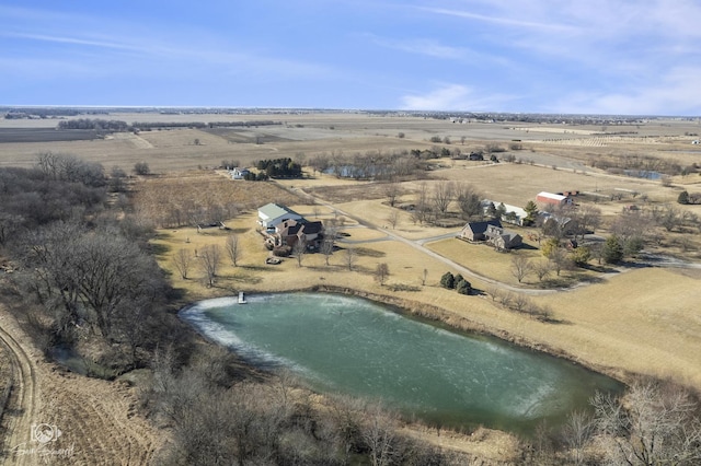 birds eye view of property with a rural view