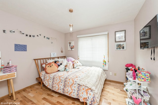 bedroom featuring light wood-type flooring