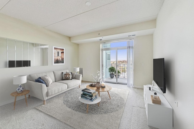 living room featuring a textured ceiling