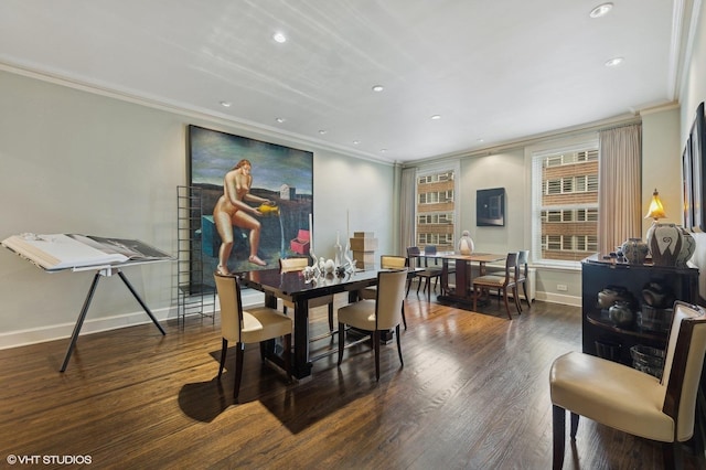 dining room featuring baseboards, ornamental molding, wood finished floors, and recessed lighting