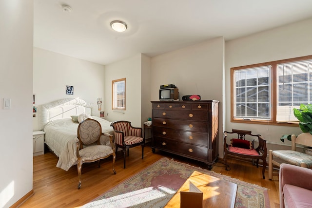 bedroom featuring hardwood / wood-style floors