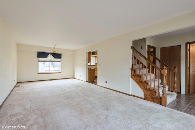 unfurnished living room with carpet flooring