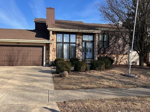 view of front of home with a garage