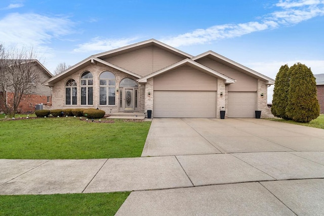 single story home with a garage and a front yard