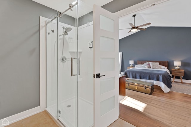 interior space featuring lofted ceiling, light hardwood / wood-style flooring, and ceiling fan