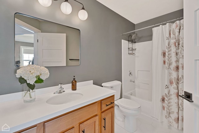 full bathroom featuring vanity, tile patterned flooring, toilet, and shower / bath combo with shower curtain