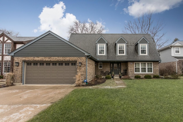 view of front of property featuring a garage and a front yard