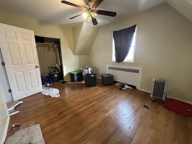 10052 S Vernon Ave, Chicago, IL 60628 - bonus room featuring radiator heating unit, ceiling fan, vaulted ceiling, and wood-type flooring