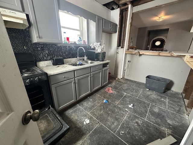 10052 S Vernon Ave, Chicago, IL 60628 - kitchen with black gas range oven, sink, gray cabinetry, and tasteful backsplash