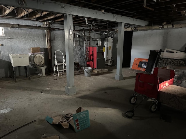10052 S Vernon Ave, Chicago, IL 60628 - basement featuring water heater and washer / clothes dryer