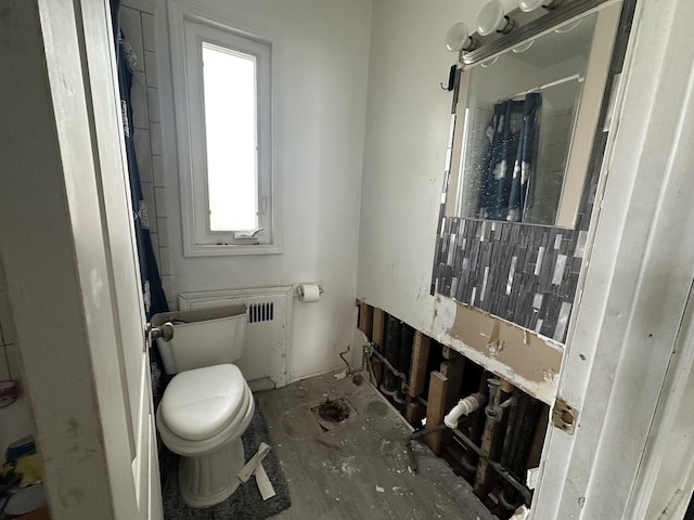 10052 S Vernon Ave, Chicago, IL 60628 - bathroom featuring radiator and toilet