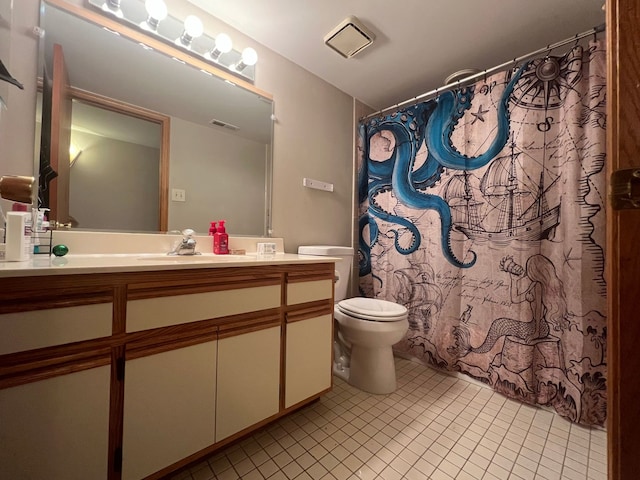 bathroom featuring vanity, curtained shower, tile patterned floors, and toilet