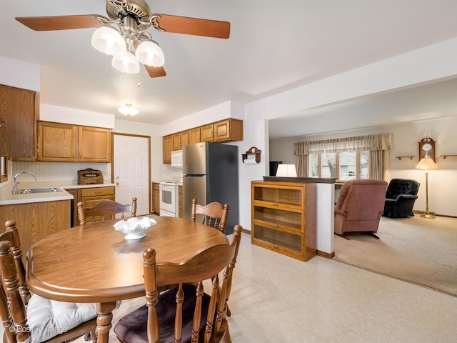 dining space featuring sink