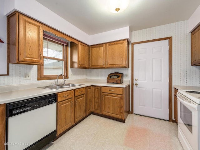 kitchen with sink and white appliances