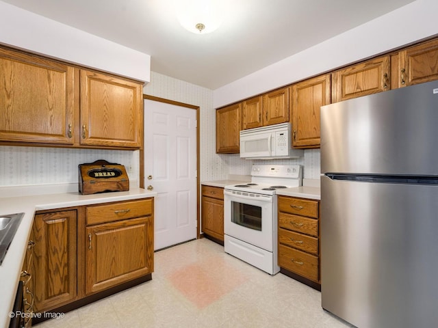 kitchen featuring white appliances