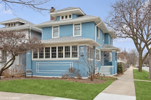 view of front of house with a front yard