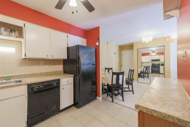 kitchen featuring tasteful backsplash, ceiling fan, black appliances, and white cabinets