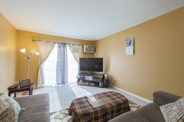 living room with a wall mounted air conditioner and light colored carpet