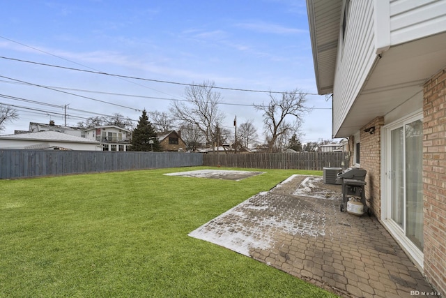 view of yard with a patio area and central air condition unit