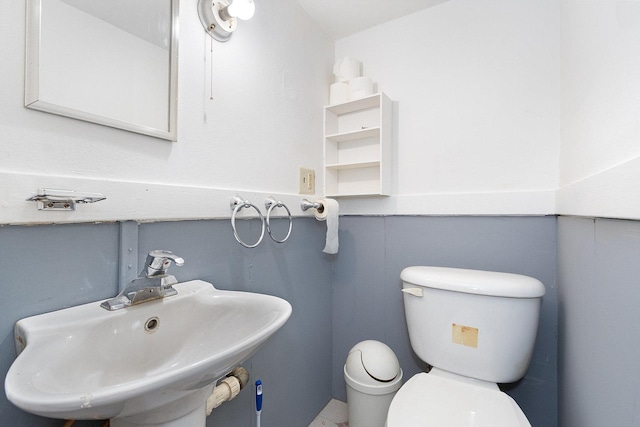 bathroom with a sink and toilet