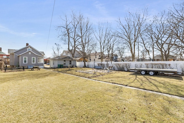 view of yard with fence