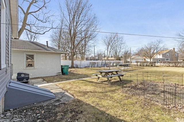 view of yard with a fenced backyard