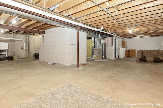 basement featuring heating unit