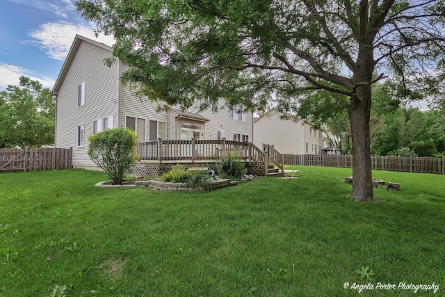 view of yard featuring a wooden deck