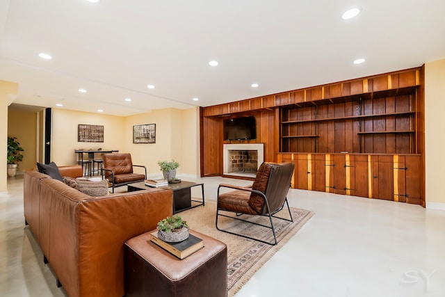 living room featuring built in shelves