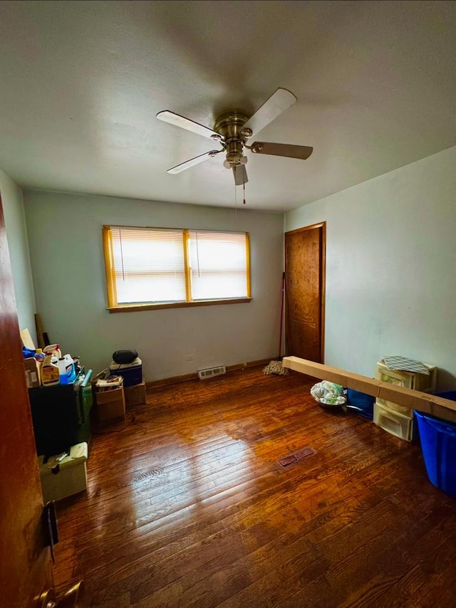 unfurnished bedroom with hardwood / wood-style flooring and ceiling fan