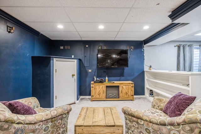 carpeted living room featuring a paneled ceiling