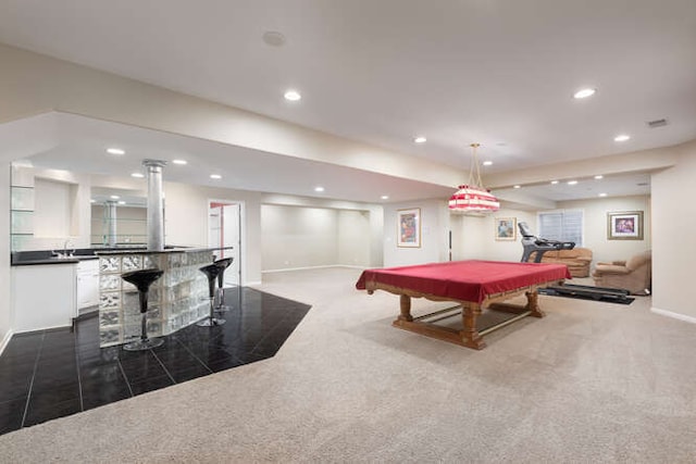 playroom featuring baseboards, dark colored carpet, a dry bar, and recessed lighting