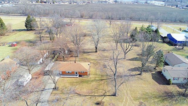 birds eye view of property featuring a rural view