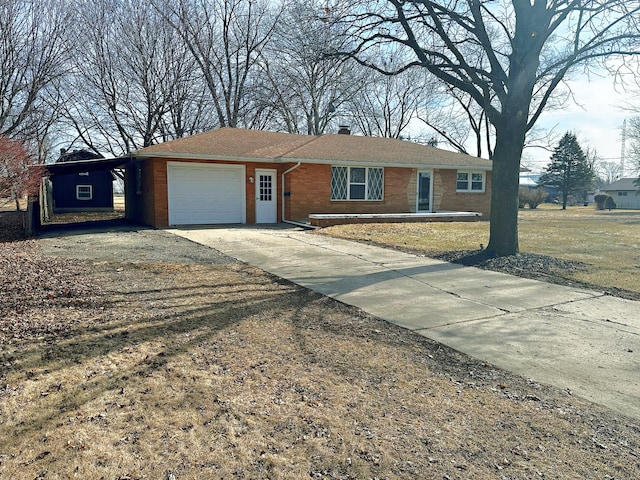 ranch-style house featuring a garage