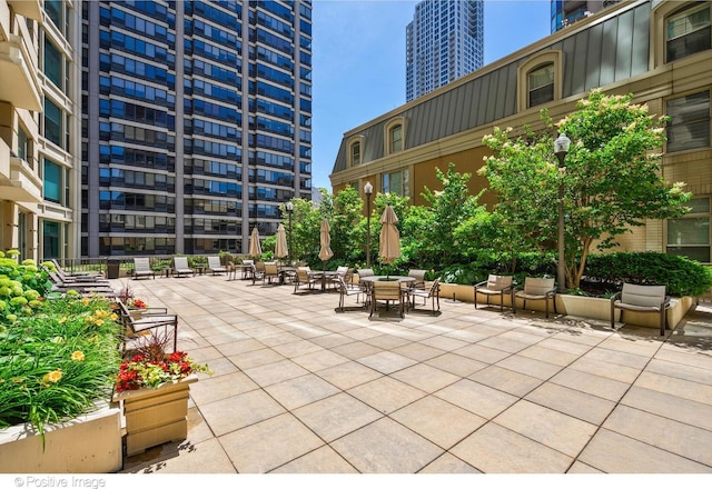 view of community with a patio