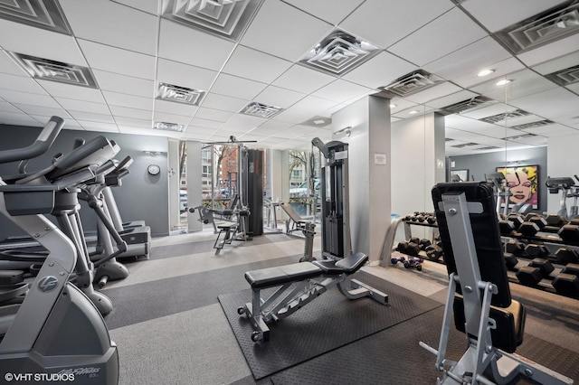 exercise room with a drop ceiling