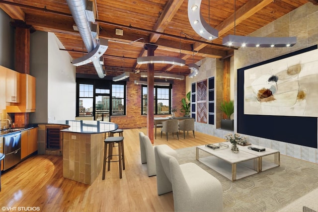 living room with beam ceiling, wooden ceiling, light hardwood / wood-style floors, and brick wall