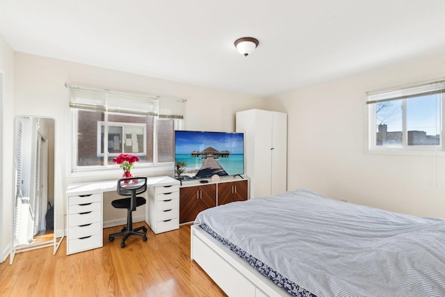 bedroom featuring light wood-type flooring