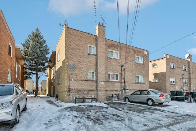 view of snow covered property