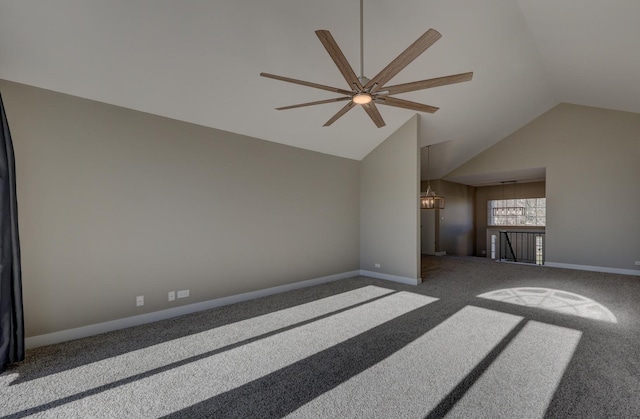 living room with ceiling fan, vaulted ceiling, and carpet