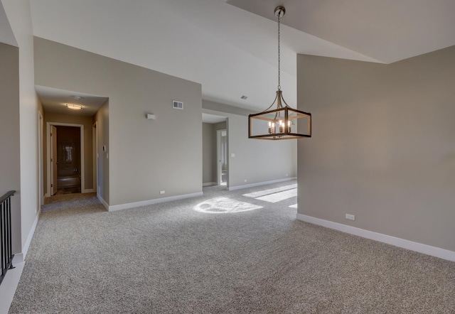 unfurnished room with an inviting chandelier, high vaulted ceiling, and light colored carpet