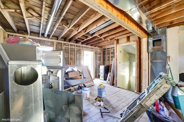 basement featuring hardwood / wood-style flooring