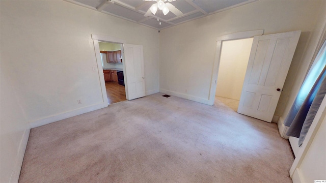 unfurnished bedroom featuring ceiling fan, connected bathroom, and light carpet