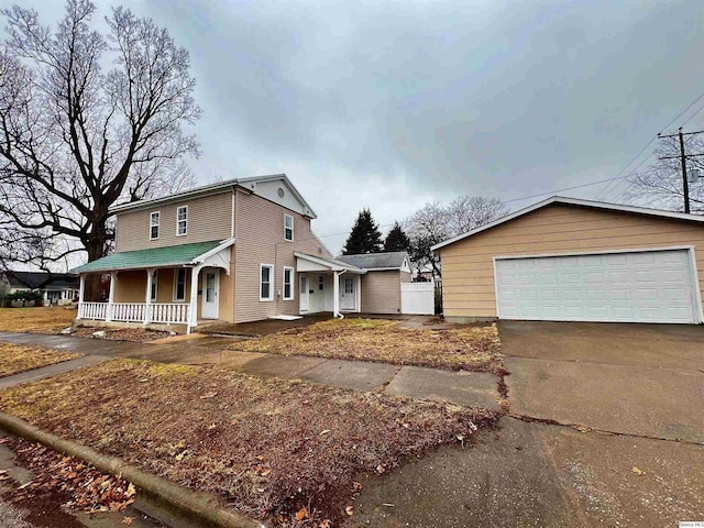 view of front of property featuring a garage and a porch