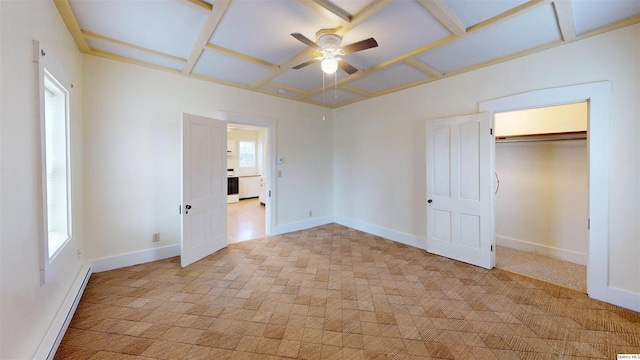 unfurnished bedroom featuring a baseboard radiator and ceiling fan