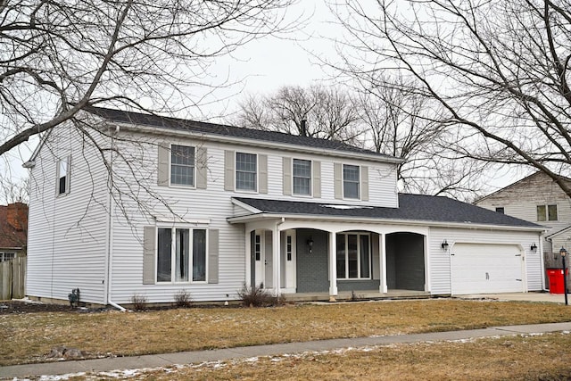 front of property with a garage and a porch