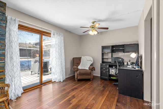 office with dark wood-type flooring and ceiling fan