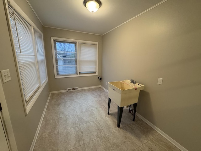 interior space featuring crown molding