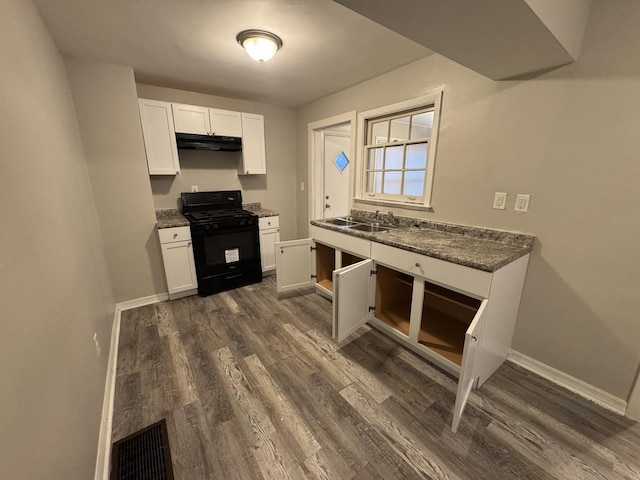 kitchen with black range with gas cooktop, sink, white cabinetry, and dark hardwood / wood-style floors