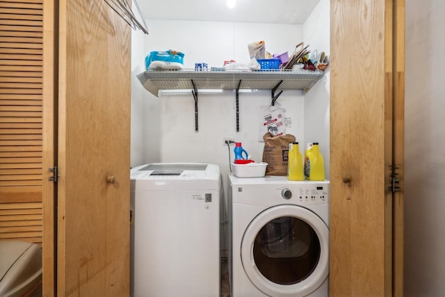 laundry area featuring laundry area and separate washer and dryer